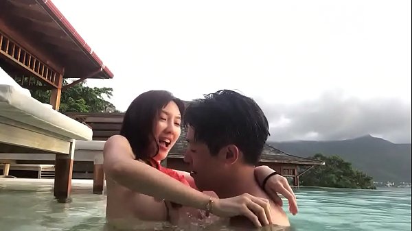 Chinese couple have fun on vacation